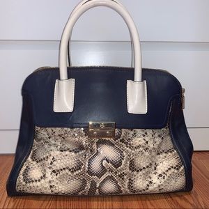 Large Tory Burch purse.